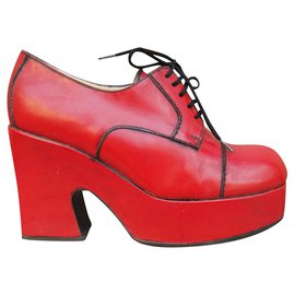 Sartore Plateauschuhe aus rotem Leder