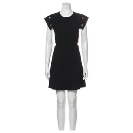 Sandro ausgeschnittenes Kleid mit Nieten