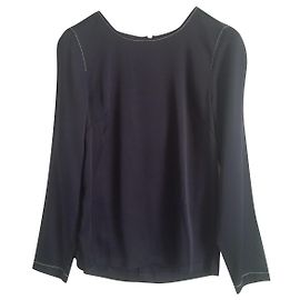 Vintage Top dal design minimale con cuciture bianche a contrasto.