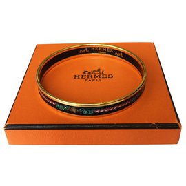 Pulseira Hermès em esmalte e banhado a ouro