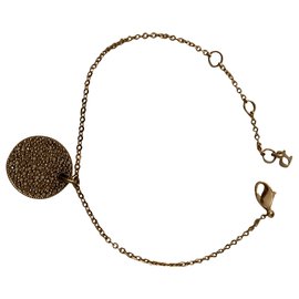 Bracciale Dior dorato con pendente tondo