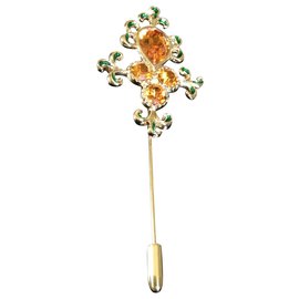 Broche Yves Saint Laurent en métal doré avec verre ambré et émail vert