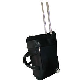 Autre Marque Trolley TUMI Weekend in pelle nera e nylon
