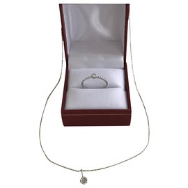 Pendente e catena solitario. Anello solitario - Djula