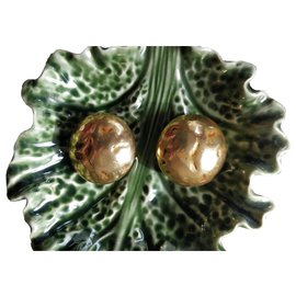 Boucles d'oreilles clips Yves Saint Laurent dorées