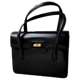 Borsa Gucci in pelle nera con manico in bambù