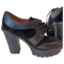 Botines Marc Jacobs de cuero negro con cordones