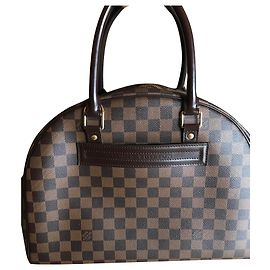Sac à main Louis Vuitton en cuir marron clair