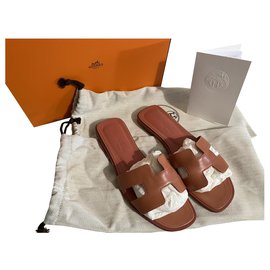 Hermès Oran Pantoletten aus Leder Rosa