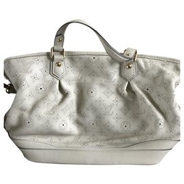 Borsa a mano Louis Vuitton in pelle traforata beige