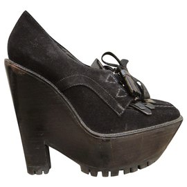 mocassini con plateau Burberry p 38