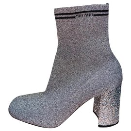 Stivaletti Miu Miu in pelle argento glitterati
