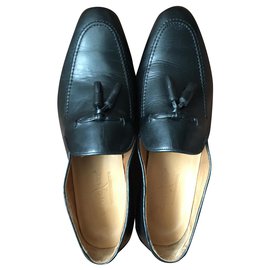 Mocassins à pompons en cuir noir - Autre Marque
