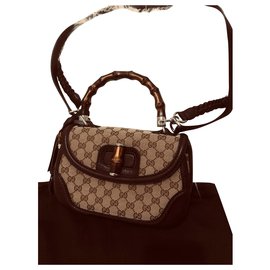Borsa a mano Gucci in pelle marrone con manico in bambù
