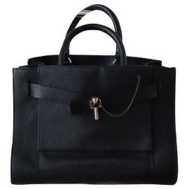 Bolso porta ropa Carven de cuero negro