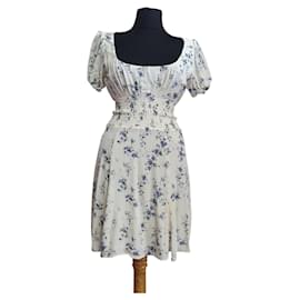 Reformation Blumenmuster Minikleid aus Viskose
