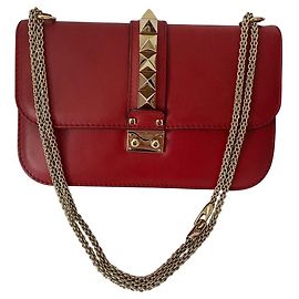 Borsa a mano Valentino in pelle rossa con catena dorata
