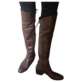 Autre Marque Botas de cano alto em couro marrom