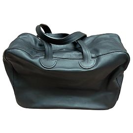 Bolsa de viaje Renaud Pellegrino de piel negra con funda para ropa