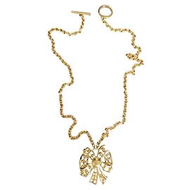 Nina Ricci Gold Knot Pendant Necklace
