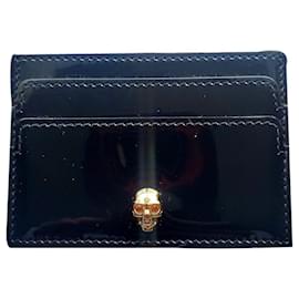 Alexander McQueen Tarjetero de piel charolada negra con calavera dorada - Alexander Mcqueen