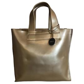 Bolso Furla de cuero beige dorado