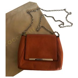Autre Marque Bolso de Hombro Coccinelle de Cuero Naranja con Cadena