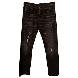 Gucci distressed denim jeans with study and crystal embroidery