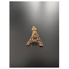Broche Eiffel Tower Yves Saint Laurent Dorée