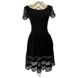 Vestido Sandro negro de algodón y angora con ribetes plateados