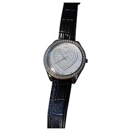 Orecchini Guess blu in similpelle
