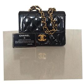 Chanel Mini Borsa a Mano Nera in Pelle con Accessori Oro