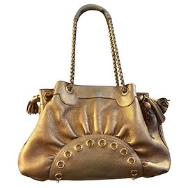Borsa a tracolla Anya Hindmarch dorata con nappa e charms