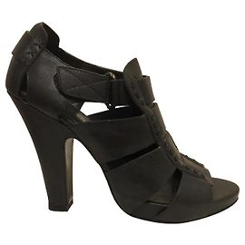 Bottega Veneta Sandália gladiadora com salto