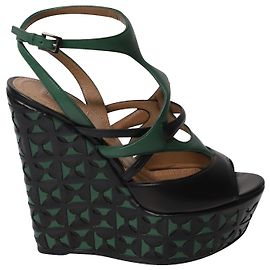 Alaïa Zeppe Alaia a intreccio a canestro tagliate al laser in pelle verde