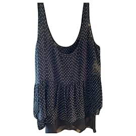 Top Club Monaco de seda azul marino con lunares blancos