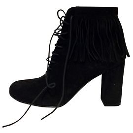 Stivaletti Saint Laurent stringati con frange