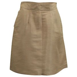Falda acampanada en seda beige con bolsillos en las costuras de Valentino