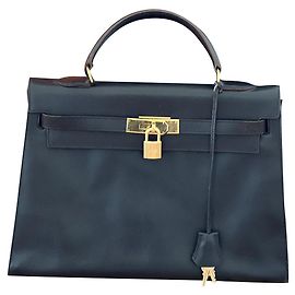 Hermès Kelly 32 Courchevel Leder Dunkelbraun