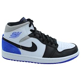 Nike Air Jordan 1 Mid SE in pelle White Hyper e Royal Black