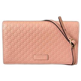 Bolso bandolera Gucci Micro Guccissima de piel rosa