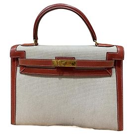 Hermès Kelly Bordeaux Boxleder mit Goldbeschlag