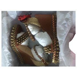 Sandali con zeppa Christian Louboutin Cordorella 110 Marrone Oro Pelle