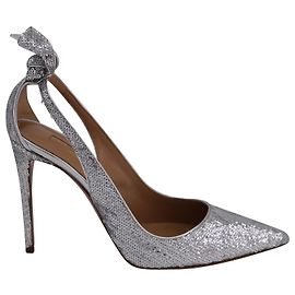 Aquazzura Pumps mit Fliege und Pailletten aus silbernem Leder