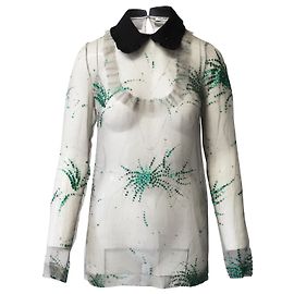 Blusa transparente adornada en seda negra de Miu Miu