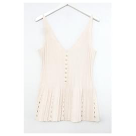 Chanel Spring 2012 Gilet in maglia con bottoni di perle con orlo peplo rosa