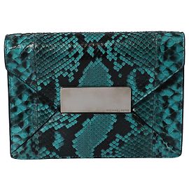 Bolso de mano en cuero verde con relieve de piel de serpiente de Michael Kors