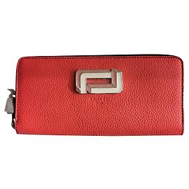Cartera Lancel de piel con cremallera color papaya