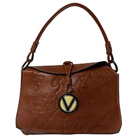 Valentino Garavani Sac Hobo Embossé Fleur en Cuir Marron