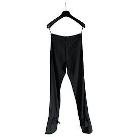 Pantalones Chanel negros de lana con lazos